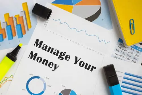 Conceptual photo about Manage Your Money with handwritten text.