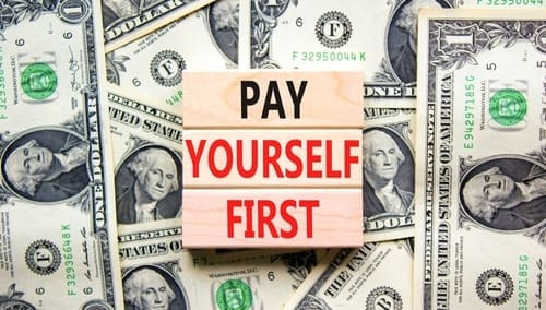 Concept words Pay yourself first on beautiful wooden blocks.