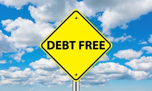 Debt free zone. Yellow road sign with debt free logo under blue sky.